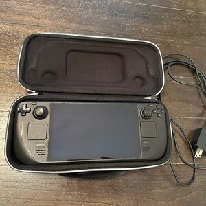 Used Valve Steam Deck OLED 512GB with case, charger, powers on, great condition!